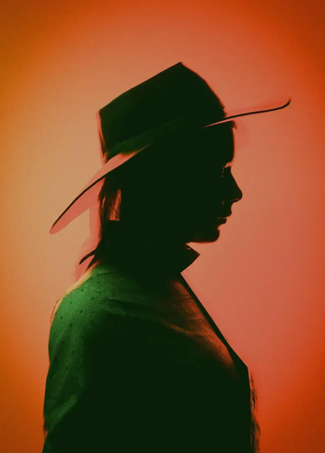 Silhouette with green leaf representing creative UI design